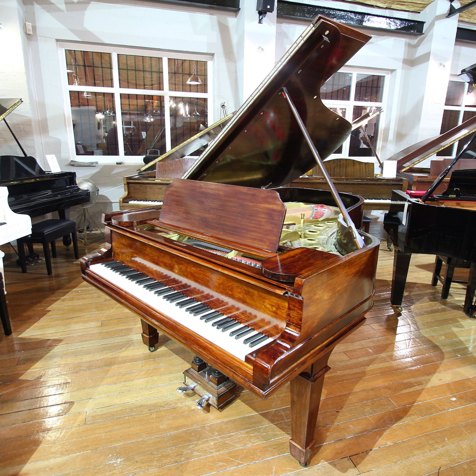Steinway Model B boudoir grand piano, in a rosewood case, for sale.