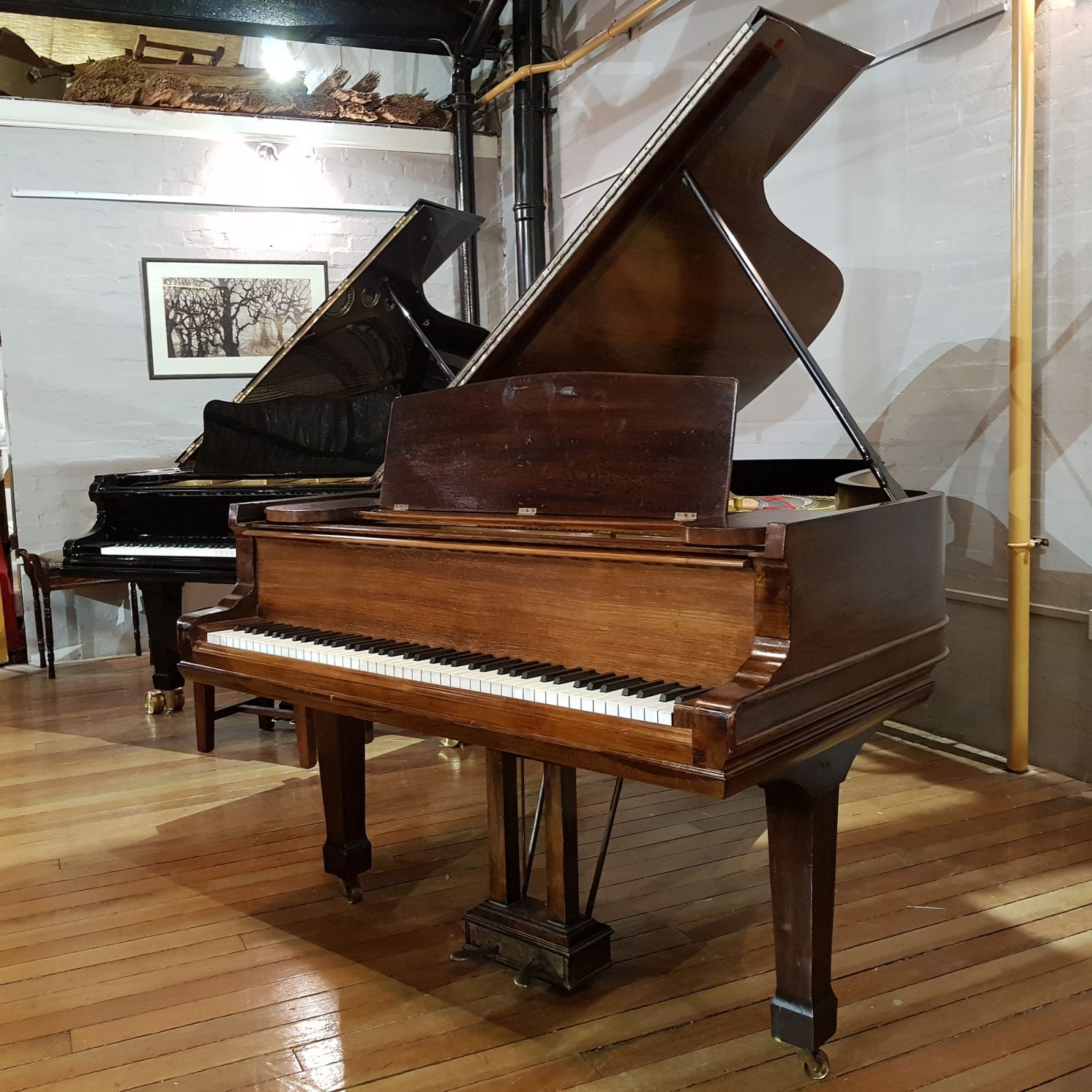 Steinway Model B boudoir grand piano, in a rosewood case, for sale.