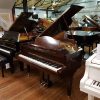 Restored Bluthner Style 4 baby grand piano, in a mahogany case, for sale.