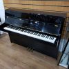 Used Kawai CX-4 for sale, in a black polyester case.