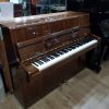 Reid Sohn S108 Upright Piano, in a walnut case, for sale.