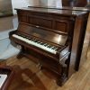 Used Bluthner upright piano for sale, in a rosewood case.