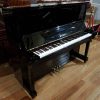 Used Kawai BL-31 upright piano for sale, in a black polyester case.